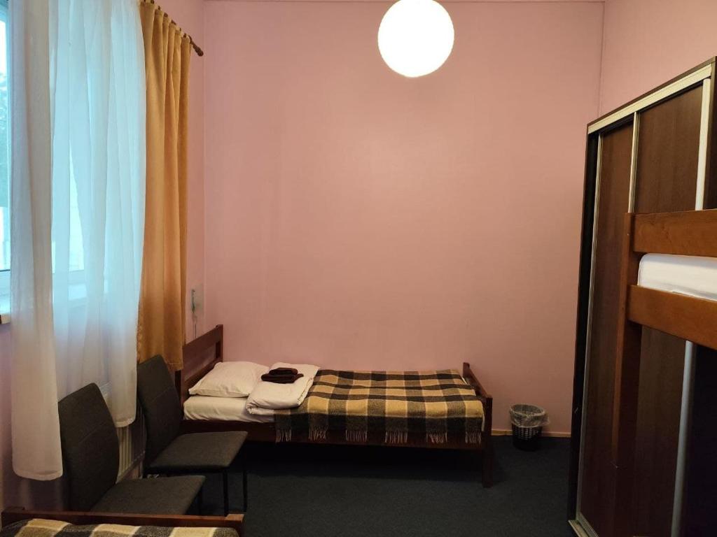 Postel nebo postele na pokoji v ubytování Mini-Hotel Ocean