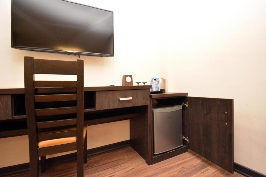 Kuchyň nebo kuchyňský kout v ubytování Partez Hotel
