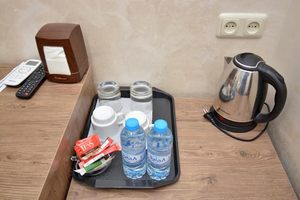 Příslušenství pro přípravu čaje a kávy v ubytování Partez Hotel