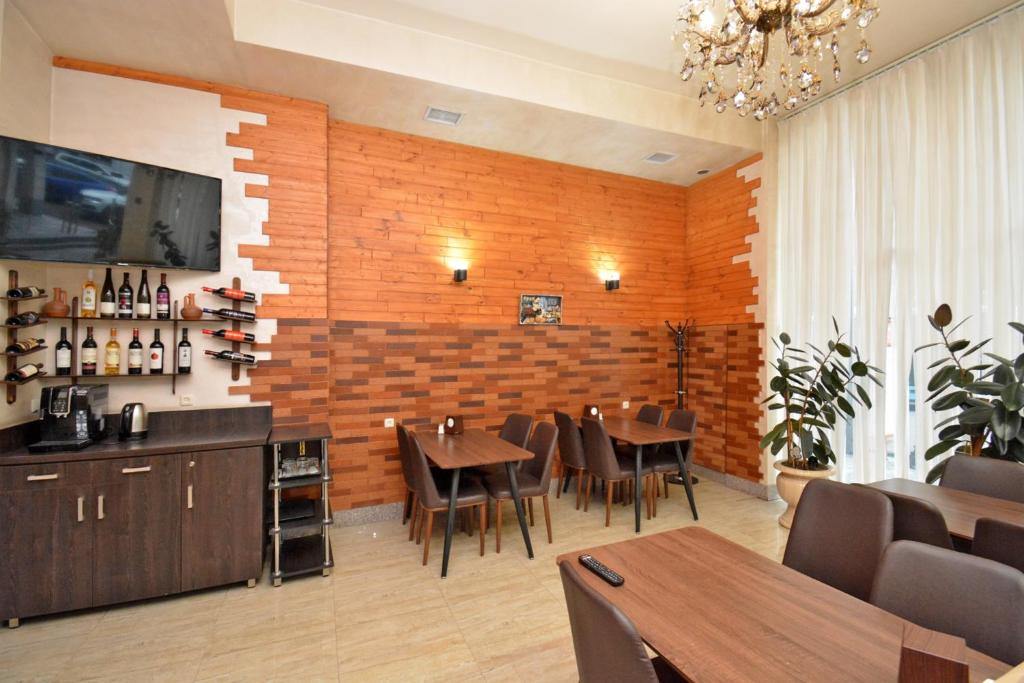 TV a/nebo společenská místnost v ubytování Partez Hotel
