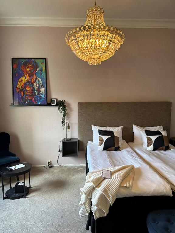 Postel nebo postele na pokoji v ubytování Hotell Onyxen, boutique- & lifestyle, Adults Only