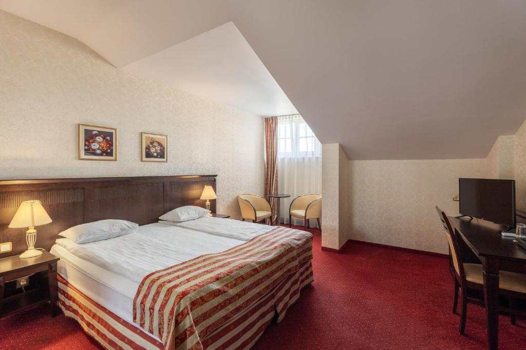 Gulta vai gultas numurā naktsmītnē Gertrude Hotel self check-in