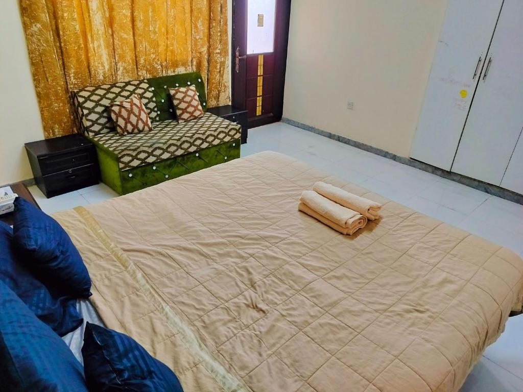 Postel nebo postele na pokoji v ubytování Private Guest Room in Kuwaitat