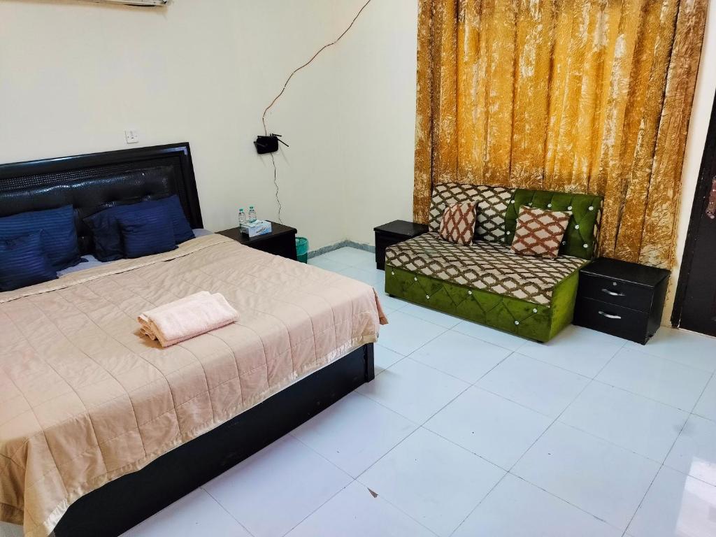 Postel nebo postele na pokoji v ubytování Private Guest Room in Kuwaitat