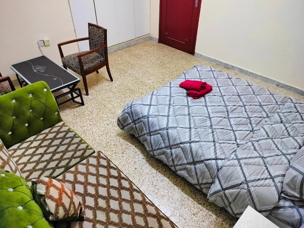 Postel nebo postele na pokoji v ubytování Private Guest Room in Kuwaitat