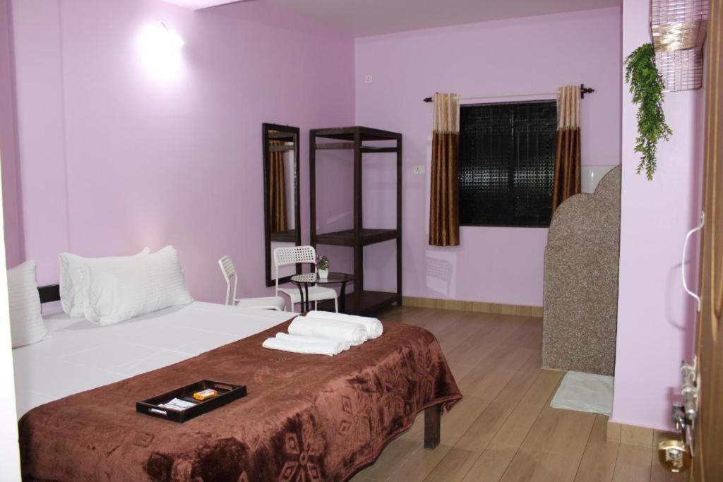 Postel nebo postele na pokoji v ubytování GuruVilla by TriSam Villa