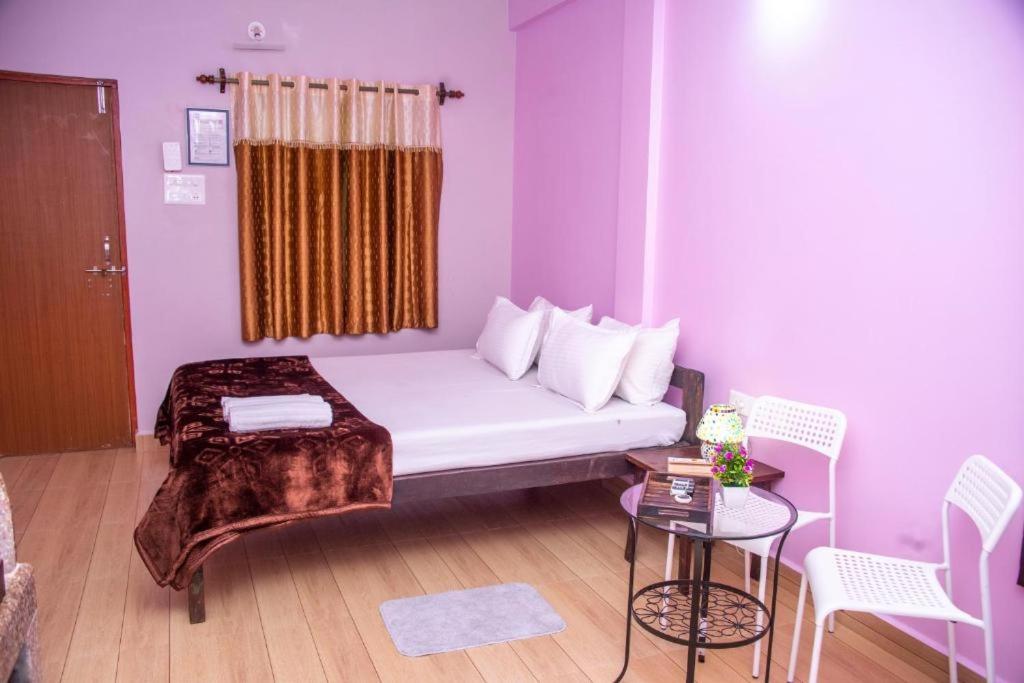 Postel nebo postele na pokoji v ubytování GuruVilla by TriSam Villa