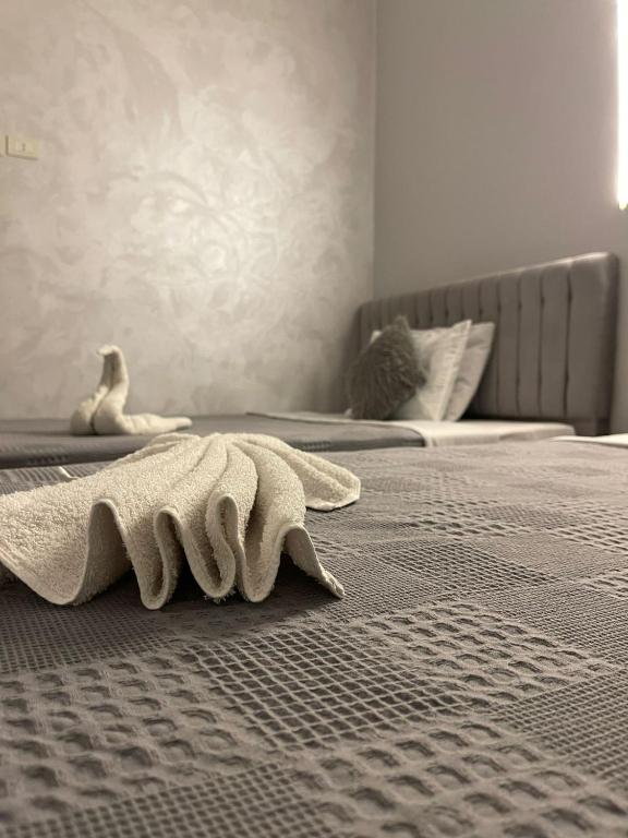 Postel nebo postele na pokoji v ubytování New One Hotel