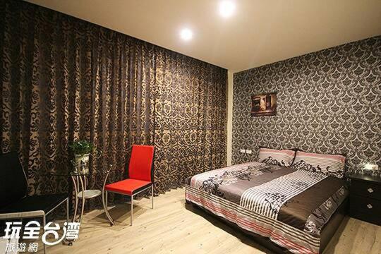 Postel nebo postele na pokoji v ubytování Aqua Night Market Homestay