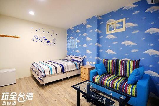 Postel nebo postele na pokoji v ubytování Aqua Night Market Homestay