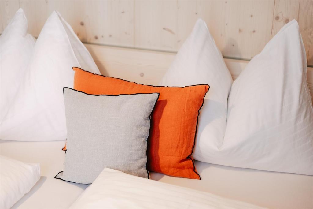 Postel nebo postele na pokoji v ubytování B&B Hotel Zimmerei mit Frühstück