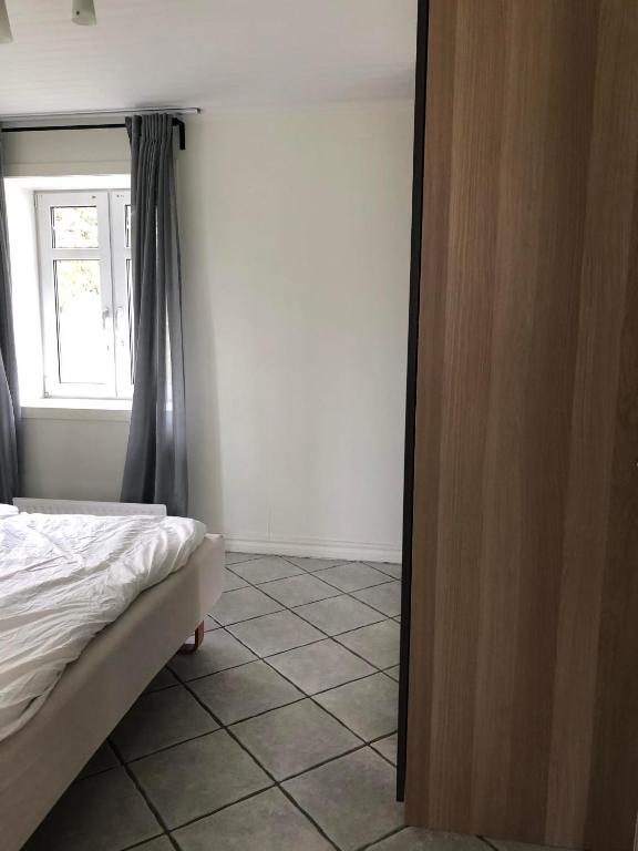 Postel nebo postele na pokoji v ubytování Norrberge 1