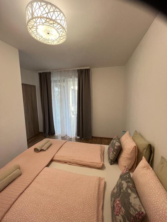 Posteľ alebo postele v izbe v ubytovaní Elite Green Apartments