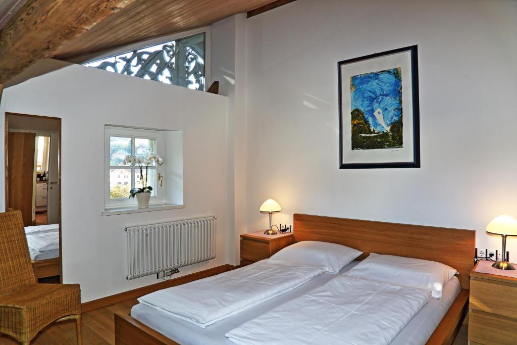 Postel nebo postele na pokoji v ubytování Villa Lageder