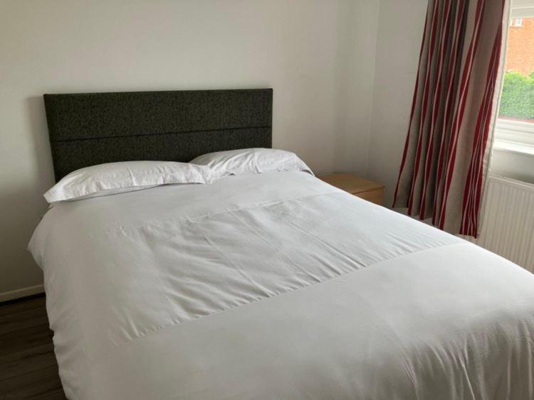 Postel nebo postele na pokoji v ubytování Central Mablethorpe Apartment