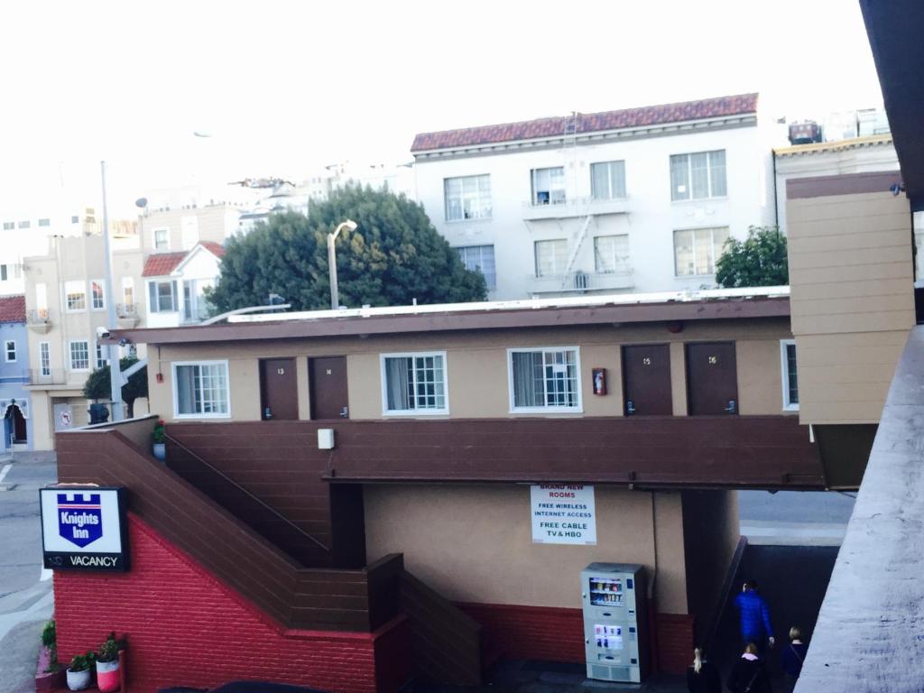 a building with a ramp on the side of it at Economy Inn in San Francisco