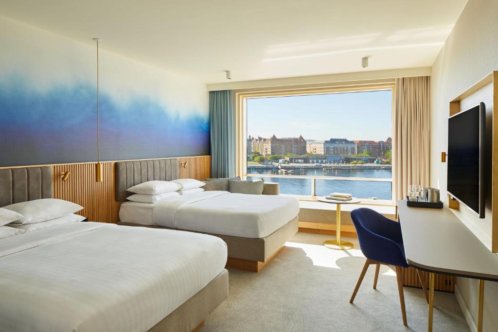 Postel nebo postele na pokoji v ubytování Copenhagen Marriott Hotel