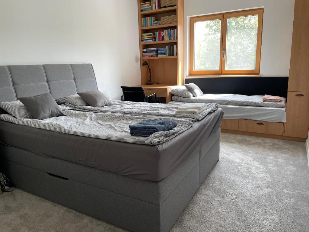 Postel nebo postele na pokoji v ubytování Bert apartman
