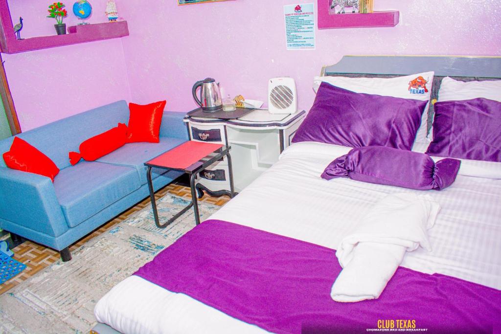 Ένα ή περισσότερα κρεβάτια σε δωμάτιο στο Texas Deluxe B&B