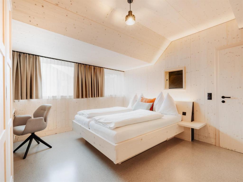 Postel nebo postele na pokoji v ubytování B&B Hotel Zimmerei mit Frühstück
