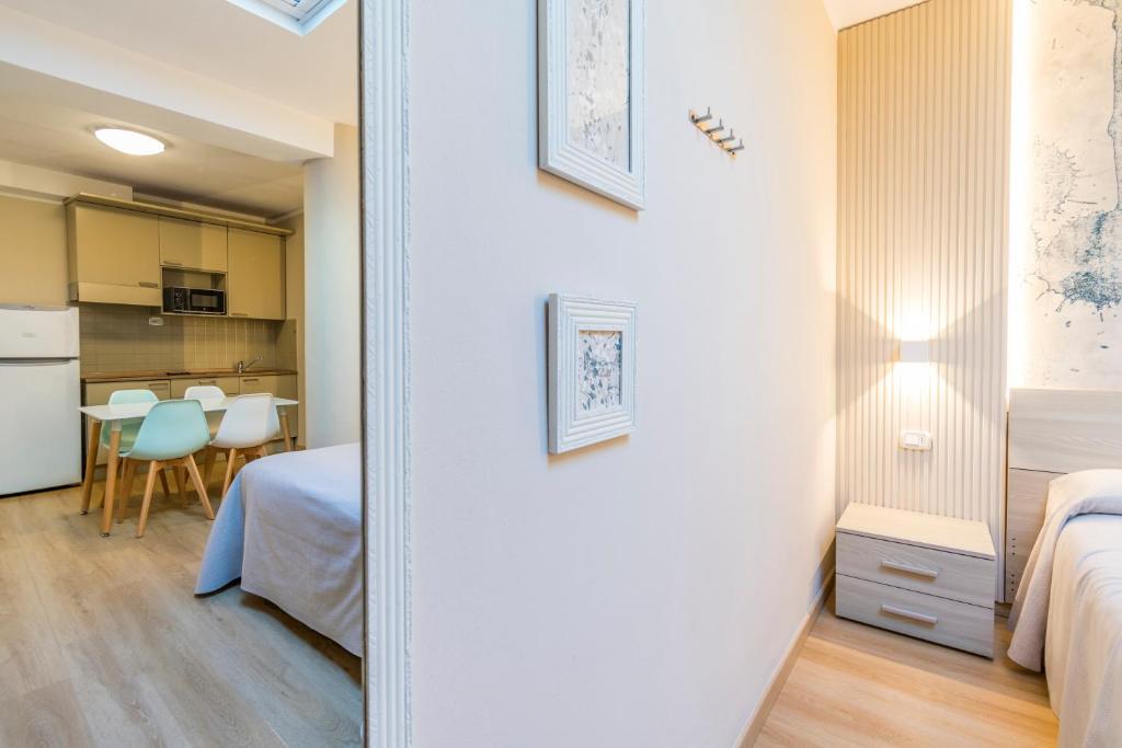 Łóżko lub łóżka w pokoju w obiekcie Residence Stella
