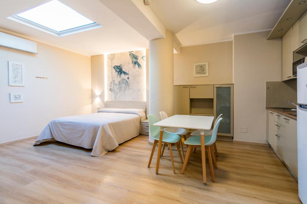Łóżko lub łóżka w pokoju w obiekcie Residence Stella
