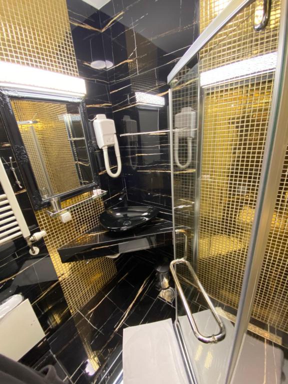 Koupelna v ubytování Hotel Pejton
