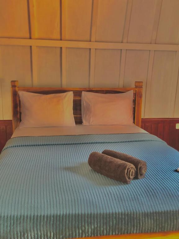 Postel nebo postele na pokoji v ubytování MASYA Cottages