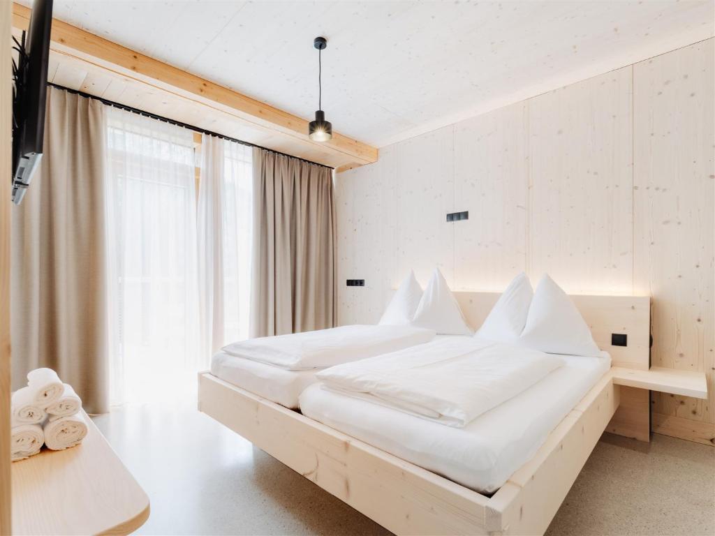 Postel nebo postele na pokoji v ubytování B&B Hotel Zimmerei mit Frühstück