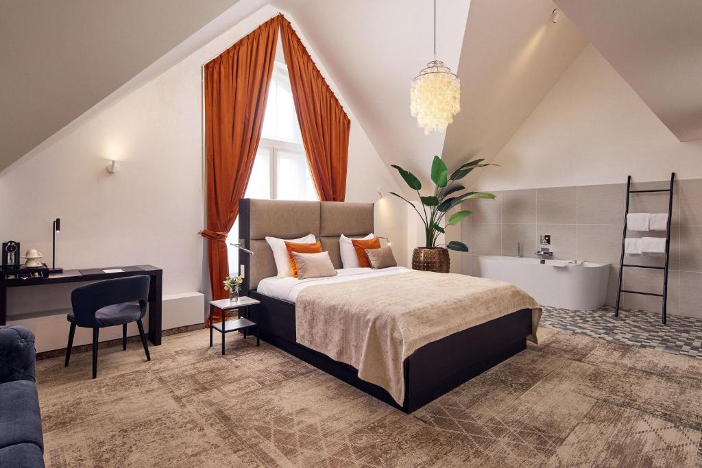 Postel nebo postele na pokoji v ubytování Van der Valk Hotel Mechelen
