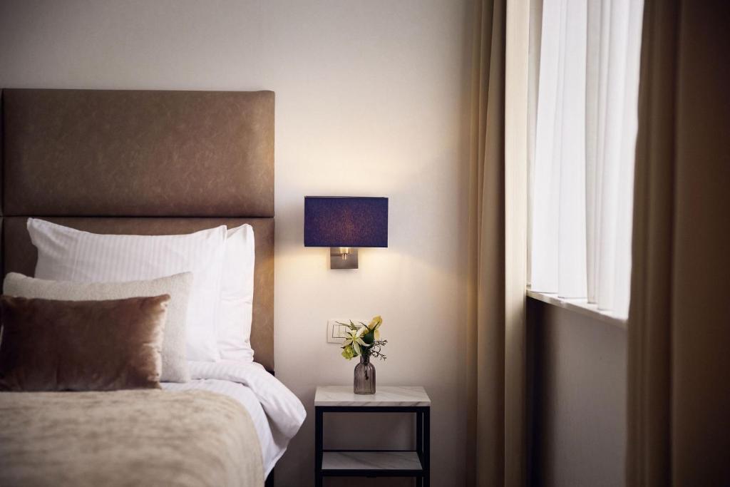 Postel nebo postele na pokoji v ubytování Van der Valk Hotel Mechelen