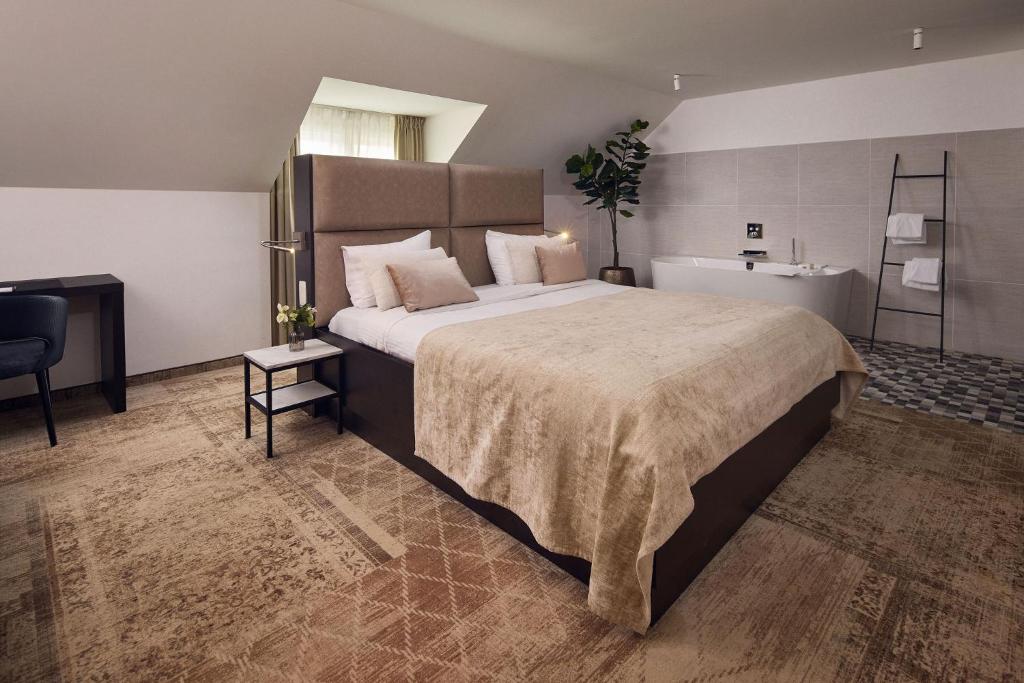 Postel nebo postele na pokoji v ubytování Van der Valk Hotel Mechelen