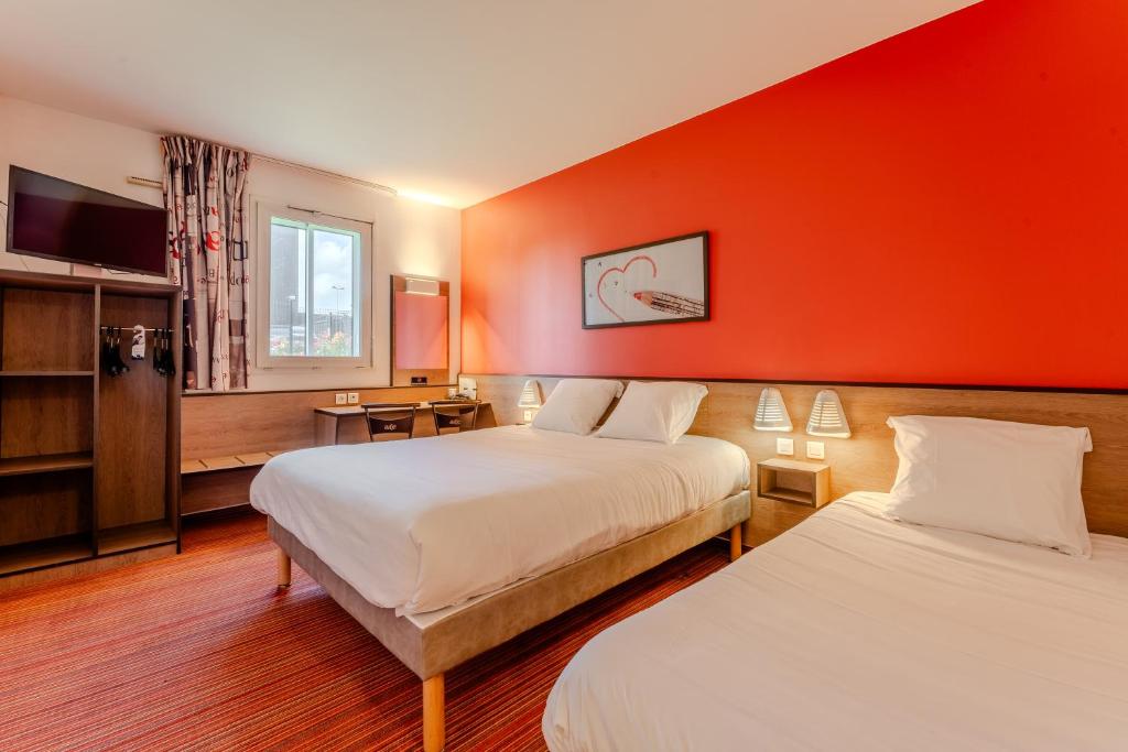 Postel nebo postele na pokoji v ubytování Ace Hotel Noyelles