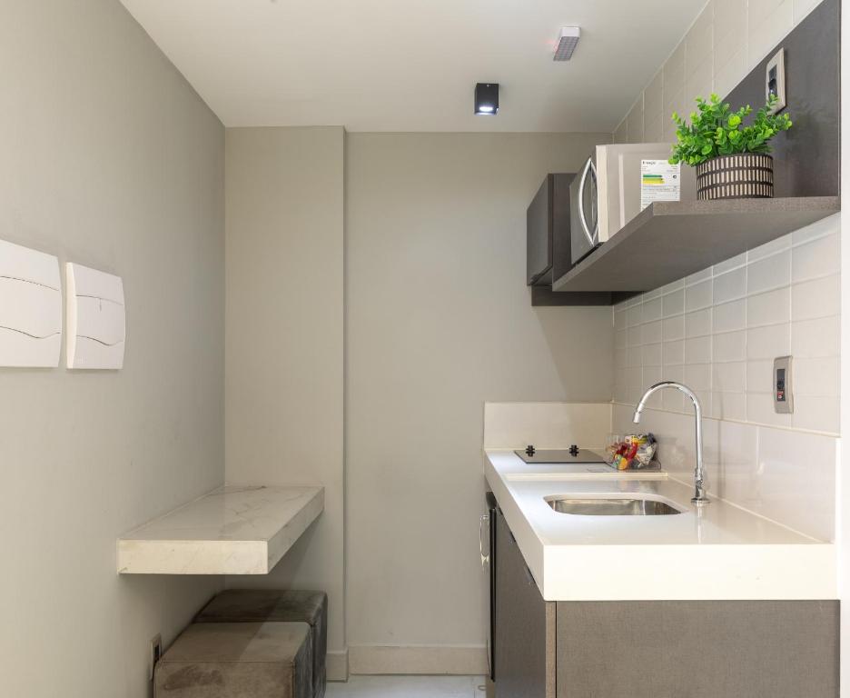 A cozinha ou cozinha compacta de Infinity at the Sea by Welkom
