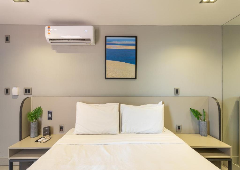 Cama ou camas em um quarto em Infinity at the Sea by Welkom