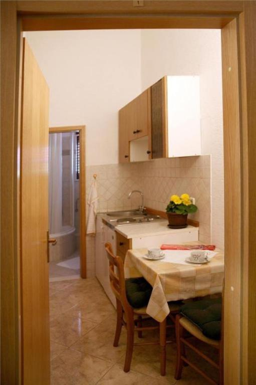 Kuchyňa alebo kuchynka v ubytovaní Apartments Bozana