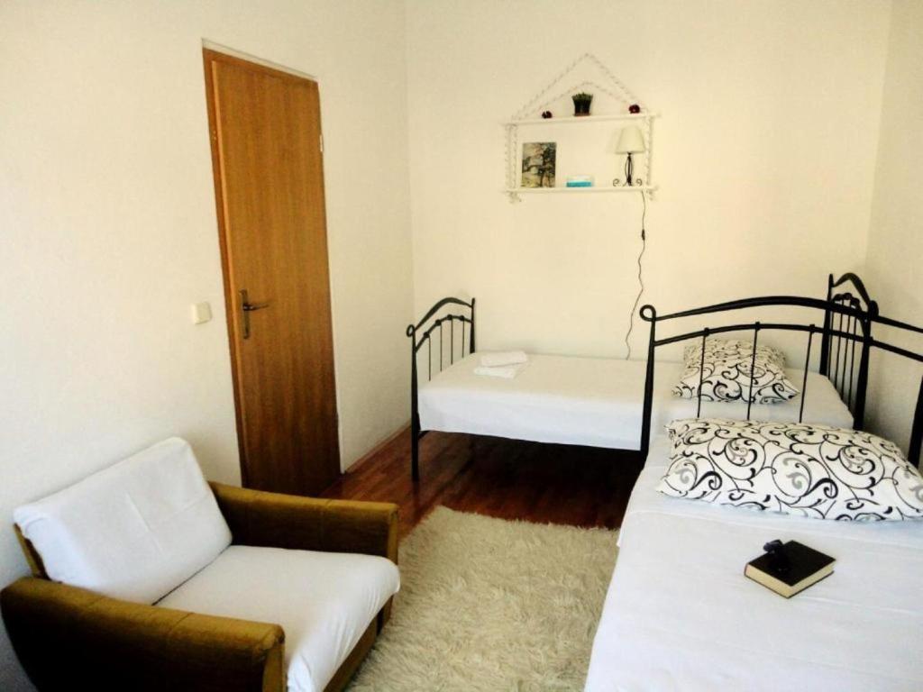 Posteľ alebo postele v izbe v ubytovaní Apartments Bozana