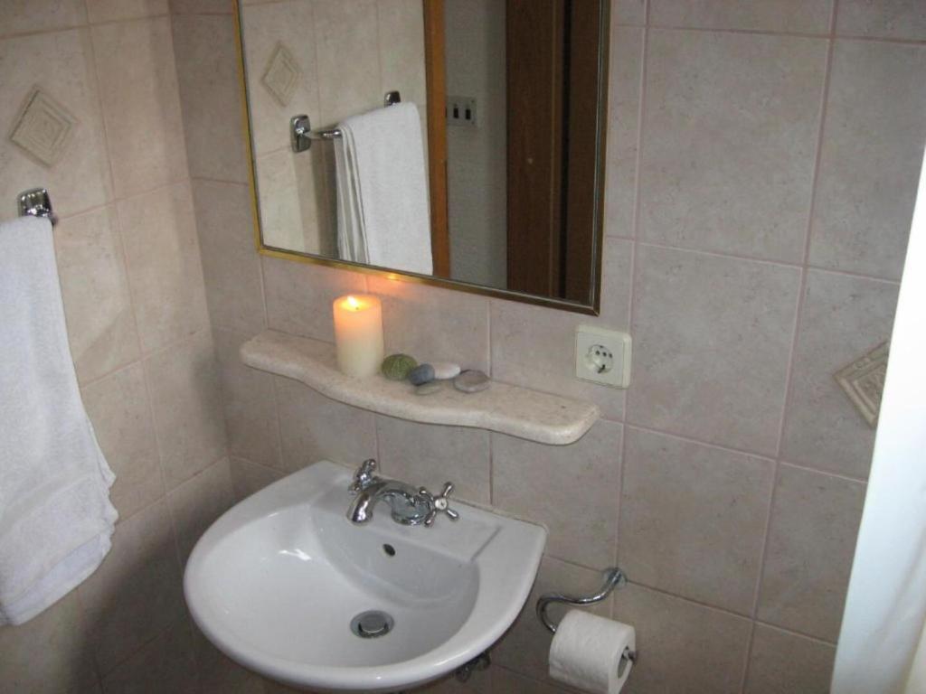 Kúpeľňa v ubytovaní Apartments Bozana