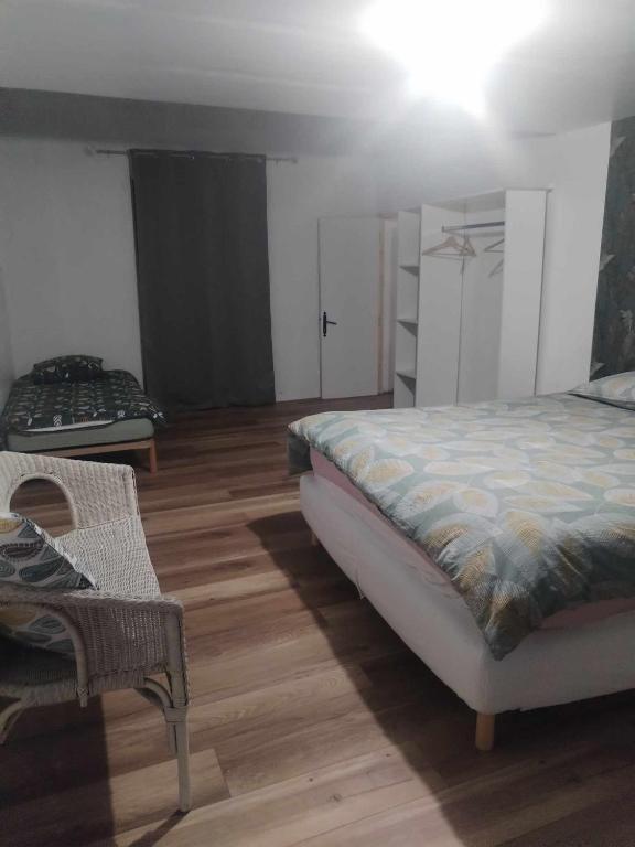 Postel nebo postele na pokoji v ubytování chambres d'hôtes rue Pasteur