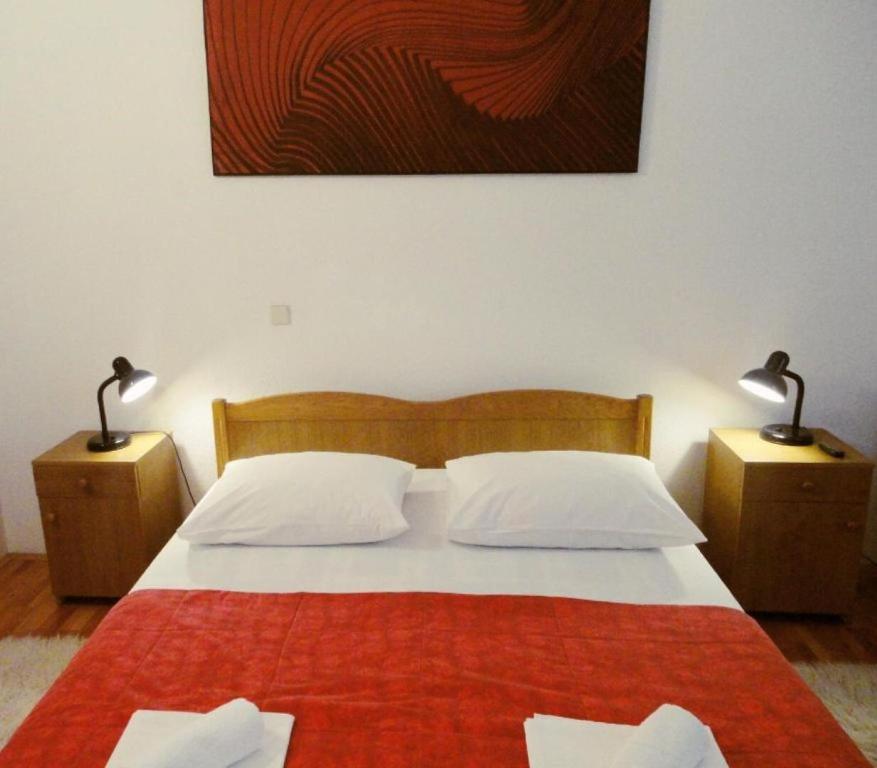 Posteľ alebo postele v izbe v ubytovaní Apartments Bozana