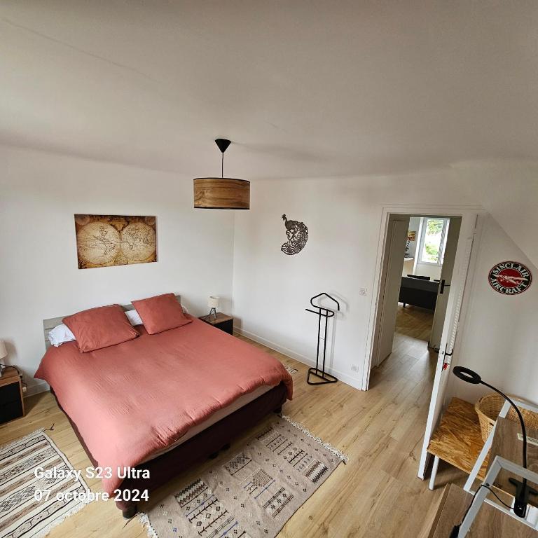 Postel nebo postele na pokoji v ubytování Le Faouët Appartement