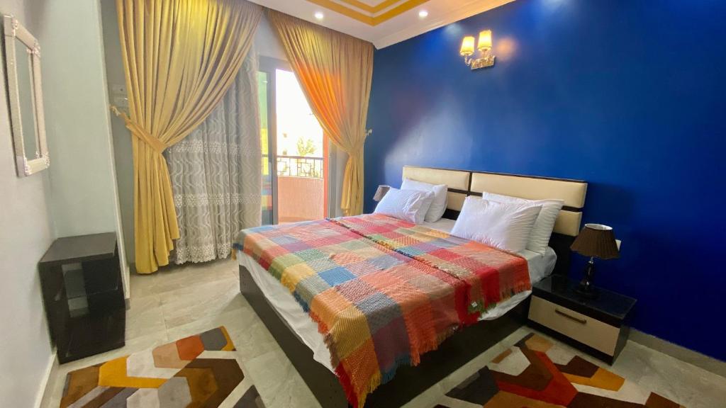 Postel nebo postele na pokoji v ubytování aswan view 3 bedrooms