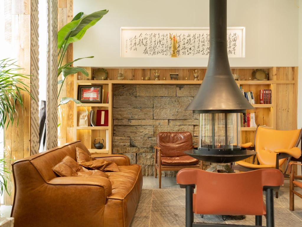 Posezení v ubytování Patio Spring Holiday Inn -- Free round trip pick-up service --Panoramic view of Tianmen Mount