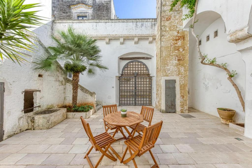A patio or other outdoor area at La Corte dei Mille