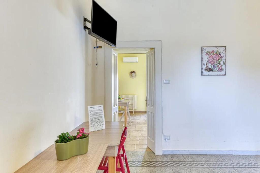 A television and/or entertainment centre at La Corte dei Mille