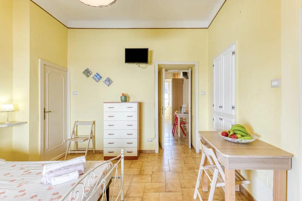 A bed or beds in a room at La Corte dei Mille