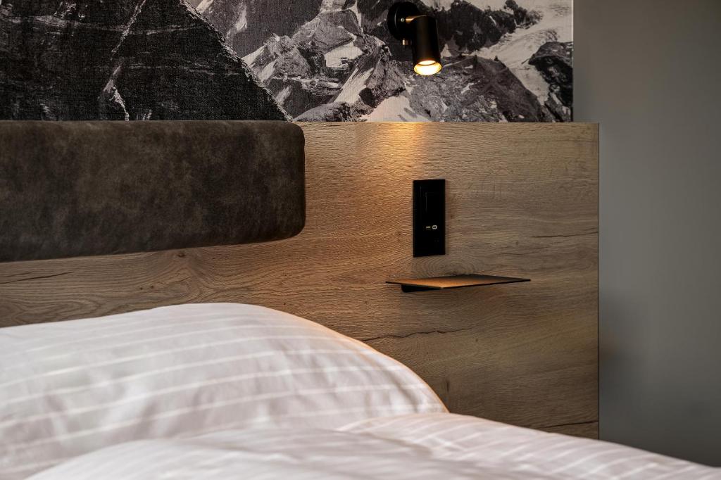 Postel nebo postele na pokoji v ubytování Zleep Hotel Lausanne-Chavannes