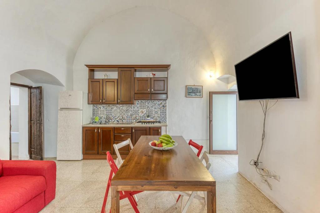 A kitchen or kitchenette at La Corte dei Mille