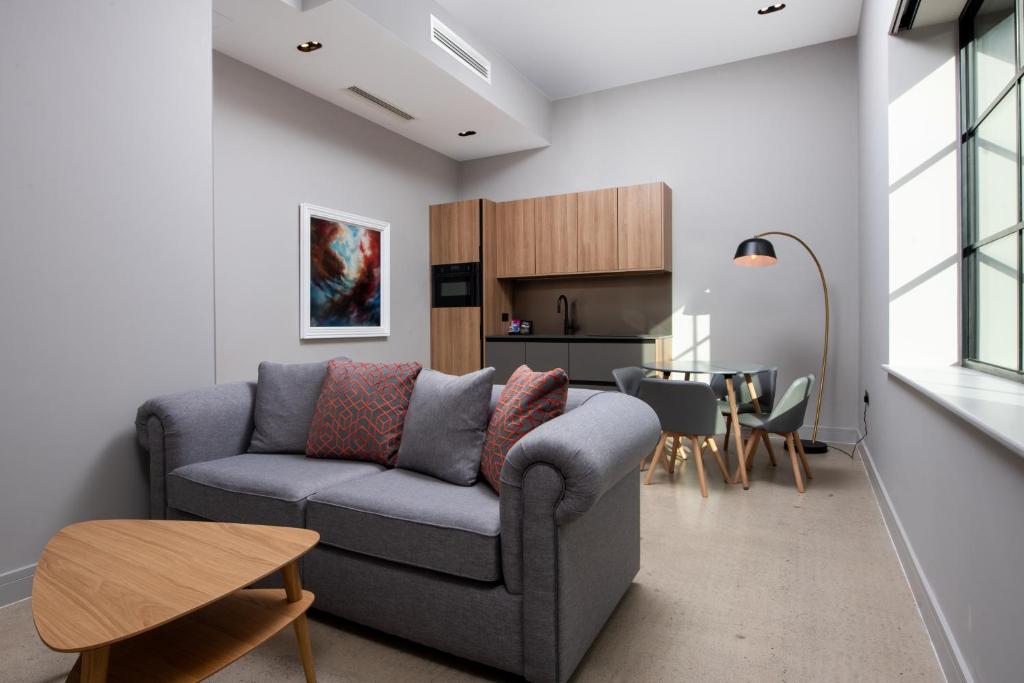 Posezení v ubytování Montgomery House Apart-Hotel