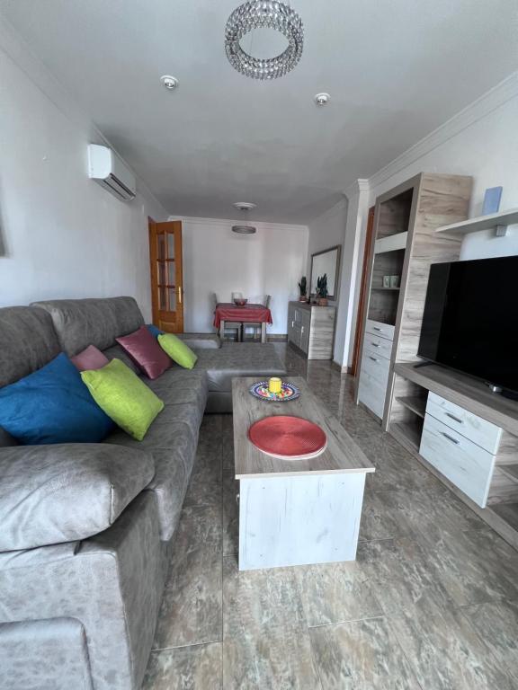 Μια τηλεόραση ή/και κέντρο ψυχαγωγίας στο Beautiful Beach Apartment